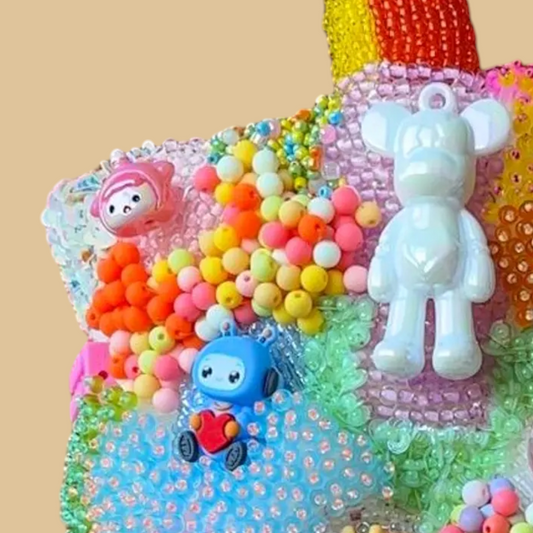 Hand-Beaded Vibrant Bucket Bag with Statement Charms and Colorful Embroidery