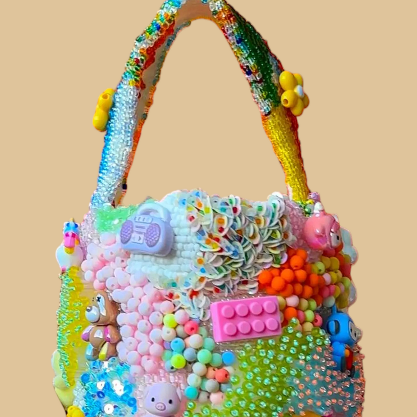 Hand-Beaded Vibrant Bucket Bag with Statement Charms and Colorful Embroidery