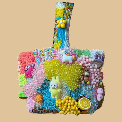 Hand-Beaded Vibrant Bucket Bag with Statement Charms and Colorful Embroidery